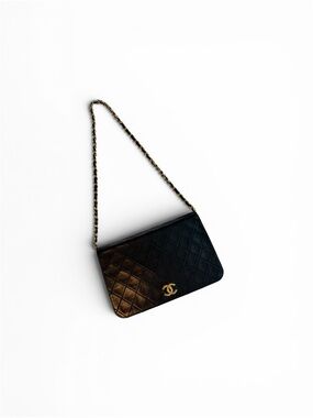 CHANEL Black Quilted Leather Shoulder Bag with Gold Hardware